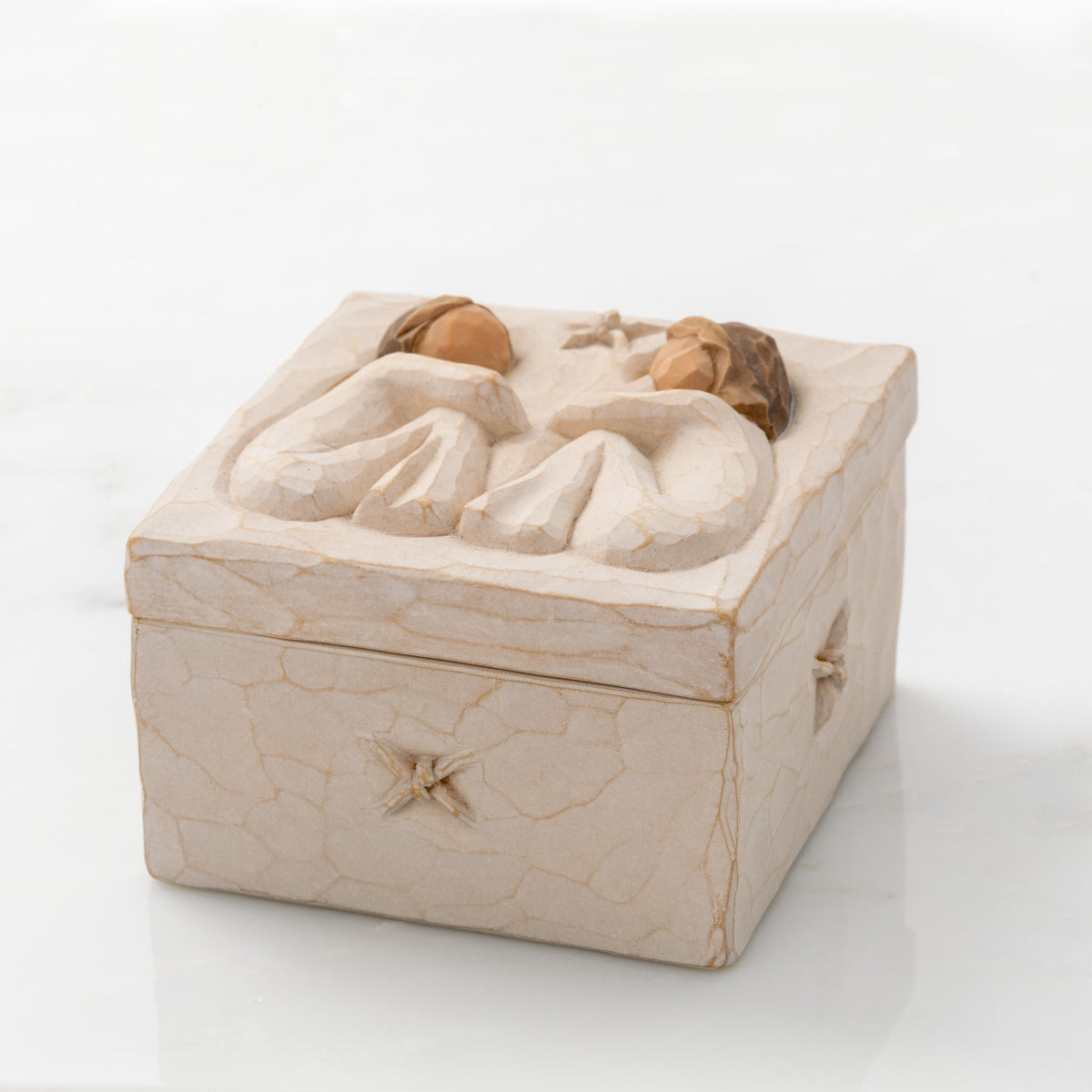 Willow Tree Friendship Keepsake Box, 3”sq x 2”h hand-painted resin box with removable lid. Lid has bas-relief carving of two seated figures in cream dresses, facing each other. Decorative knot icon carved into box side